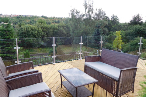 stainless and glass balustrade decking view